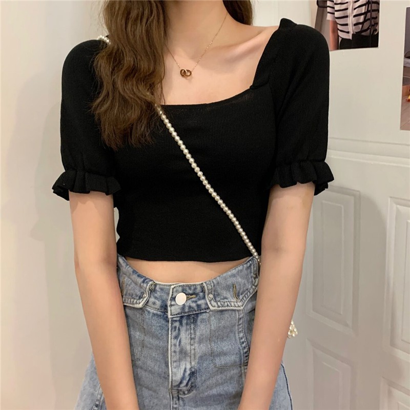 Áo đen dệt kim tay phồng DA199