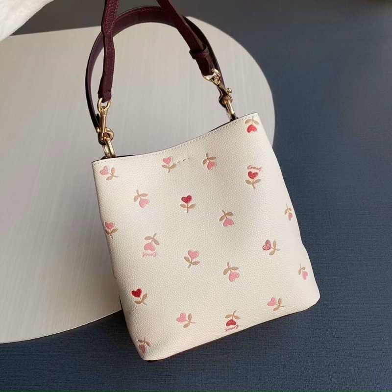 Túi Coach bucket hoa xinh size nhỏ