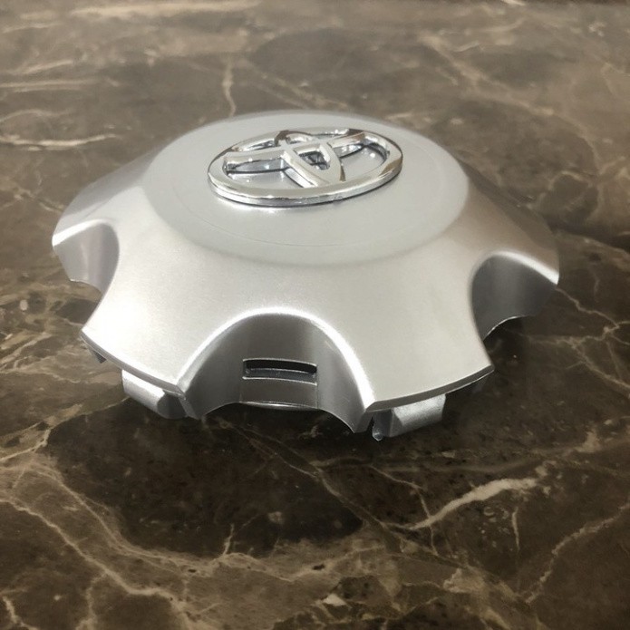 Sản Phẩm Logo chụp mâm, ốp lazang bánh xe ô tô Toyota Land Cruiser Prado TY-116 ( đời 2009, 2010, 2011, 2012, 2013) .