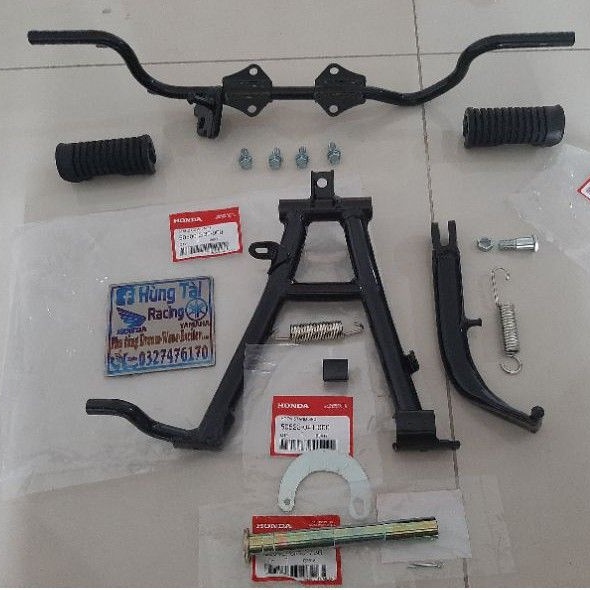 Full bộ gác chân , chống đứng xe DREAM thái zin honda