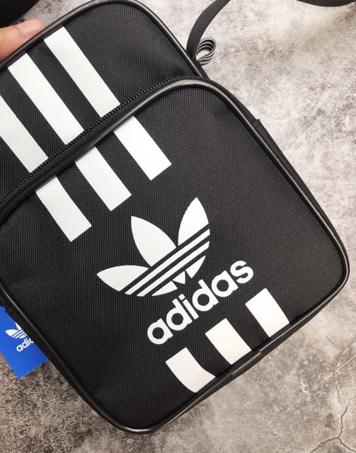 Túi mini thể thao đen sọc trắng