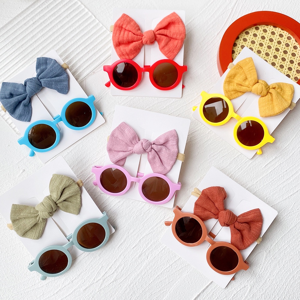 Set 2 món KIDSBOWS với dây cột tóc đính nơ+kính râm phong cách vintage cho bé gái