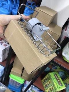 Kệ để đồ rửa chén cạnh vòi rửa