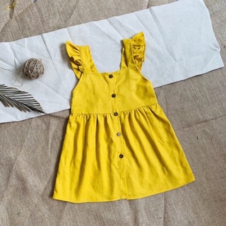 Đầm next vàng linen bé gái