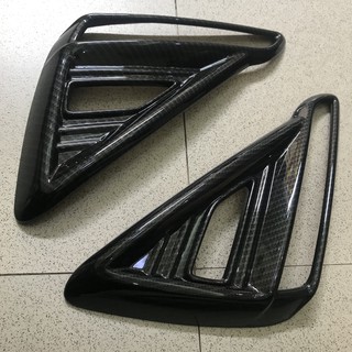 Bộ ốp trang trí viền đèn gầm sau xe Kia Cerato 2019 vân các bon