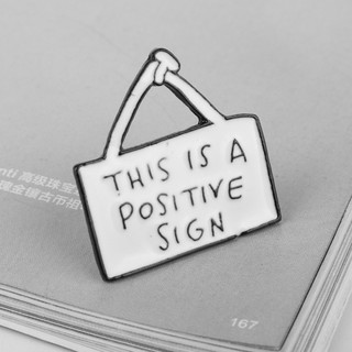 Huy hiệu cài áo " This is a Positive "