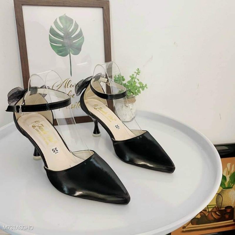 Giày sandal bít mũi đính nơ gót