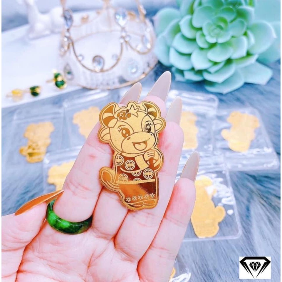 Trâu vàng , thần tài ạ , để trong ví , hoặc sau ốp điện thoại rất lộc lá trong năm TÂN SỬU này ạ