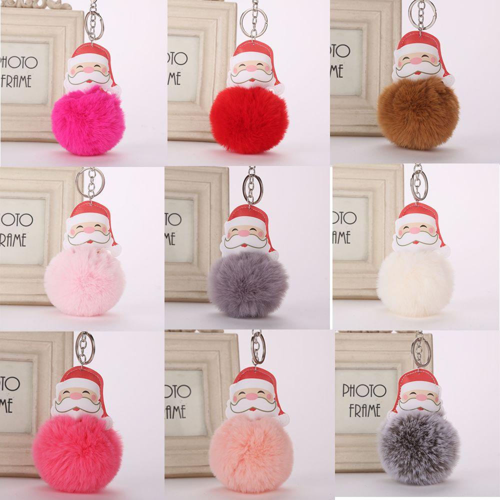 Móc Khóa Hình Ông Già Noel Đính Banh Lông Xinh Xắn