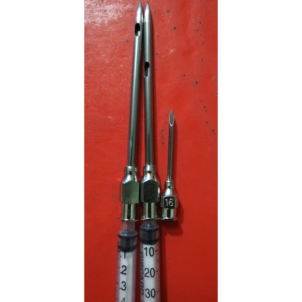 Bơm kim tiêm dùng để bơm hóa chất trị sâu đục thân trên cây trồng và vật nuôi chó mèo