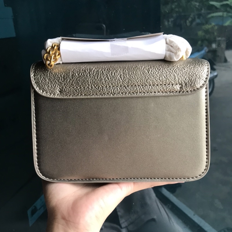 TÚI KHUY BẤM MÀU NHŨ BẠC HAI ĐINH SƯỜN MẶT DƯỚI DA TẾT