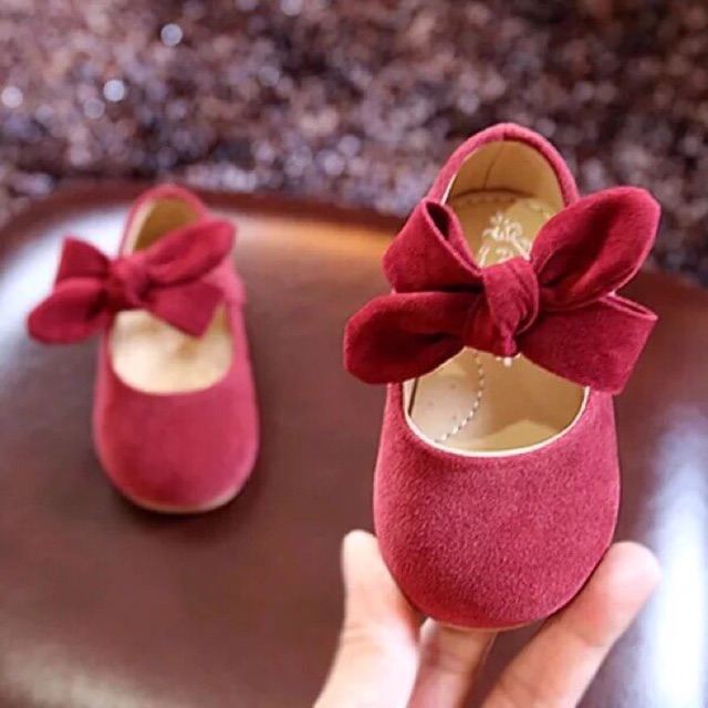 Giày nhung nơ đỏ