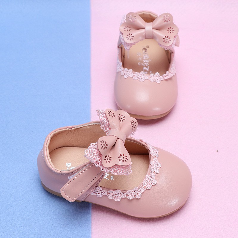 Giày sandal bằng da PU êm chân với trang trí nơ xinh xắn cho bé gái