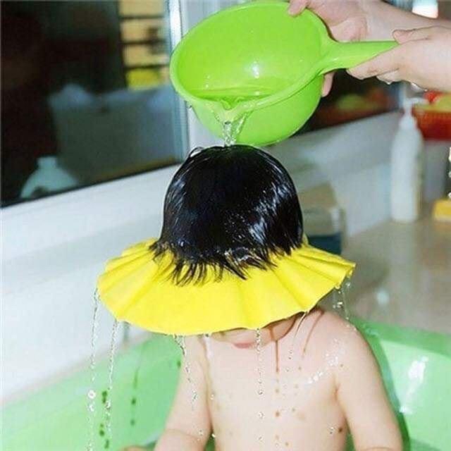 Mũ tắm chắn nước cho bé -  cúc bấm