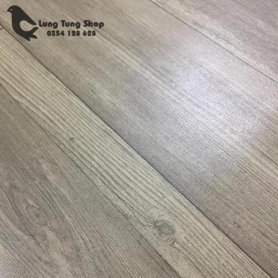 Thảm nhựa simili trải sàn vân gỗ xám - bề mặt nhám hiện rõ vân gỗ như thật