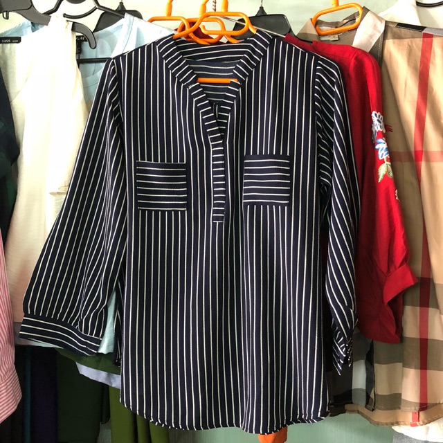 Áo sơ mi cổ v trụ