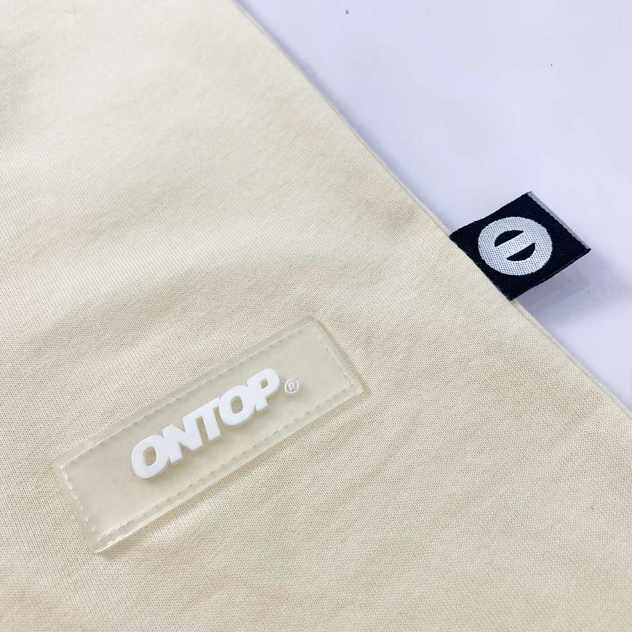 Áo thun form rộng nam nữ ONTOP màu kem họa tiết cá tính local brand Note | O18-T7