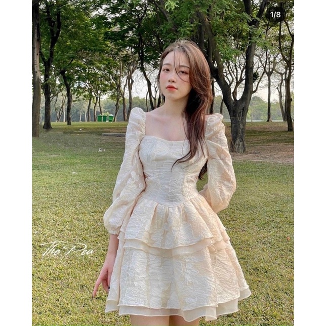 ND217 Đầm ren kem tay dài cut out eo dáng ngắn xoè.