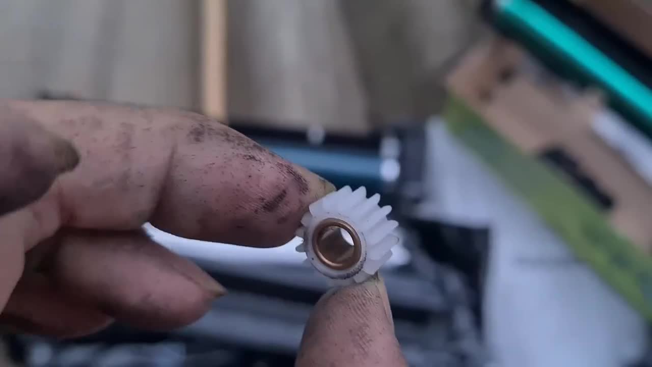 Bánh răng quay đầu cụm trống máy phô tô Ricoh 1027 2550 3350 3351 (QUAI XÁCH ĐEN)