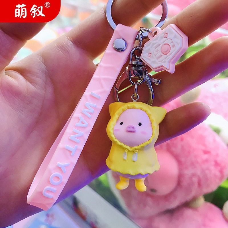 Hoạt Hình Móc Khóa Nhựa Hình Chú Heo Mặc Áo Mưa Dễ Thương