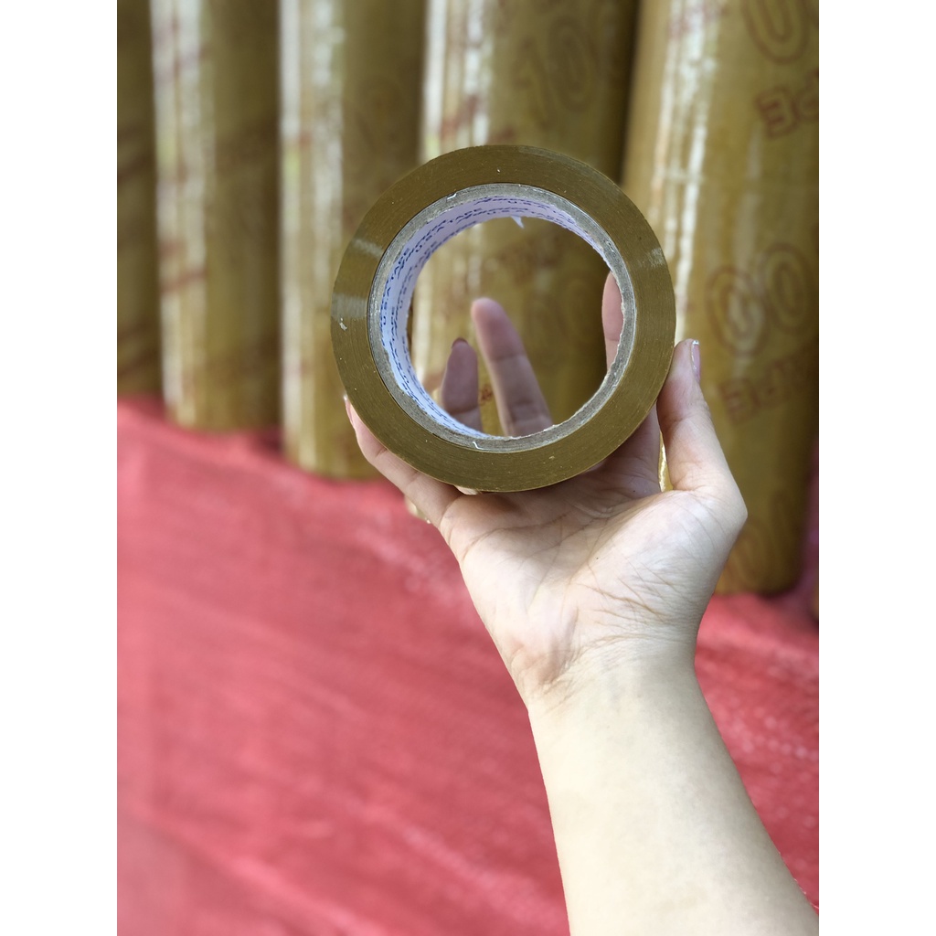 Băng keo vàng đục 4,8cm-200yard lõi 3.5li để đóng hàng 1,2kg 6 cuộn giá sỉ