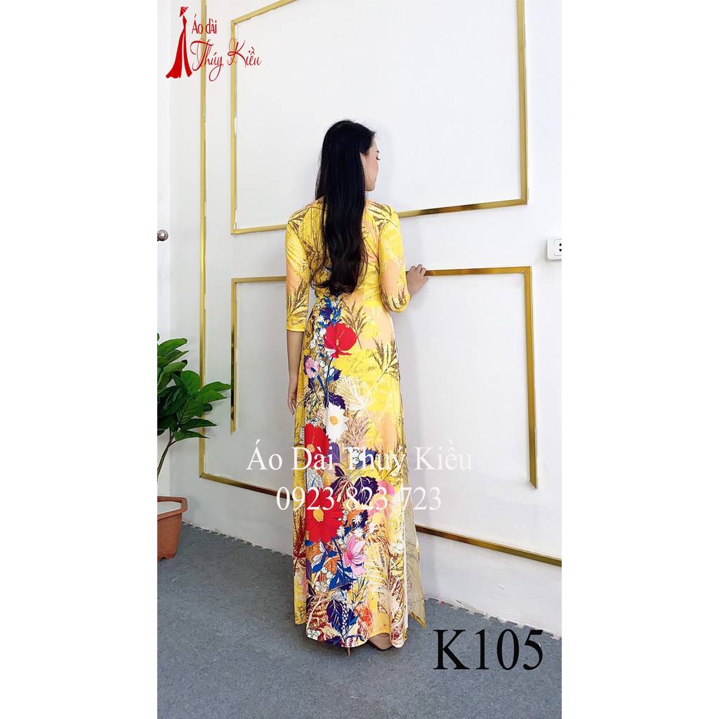 Áo dài in 3D lụa Nhật màu vàng hoa đỏ cúc trắng K105