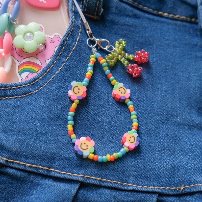 Dây treo điện thoại hoa mặt cười và cherry dễ thương