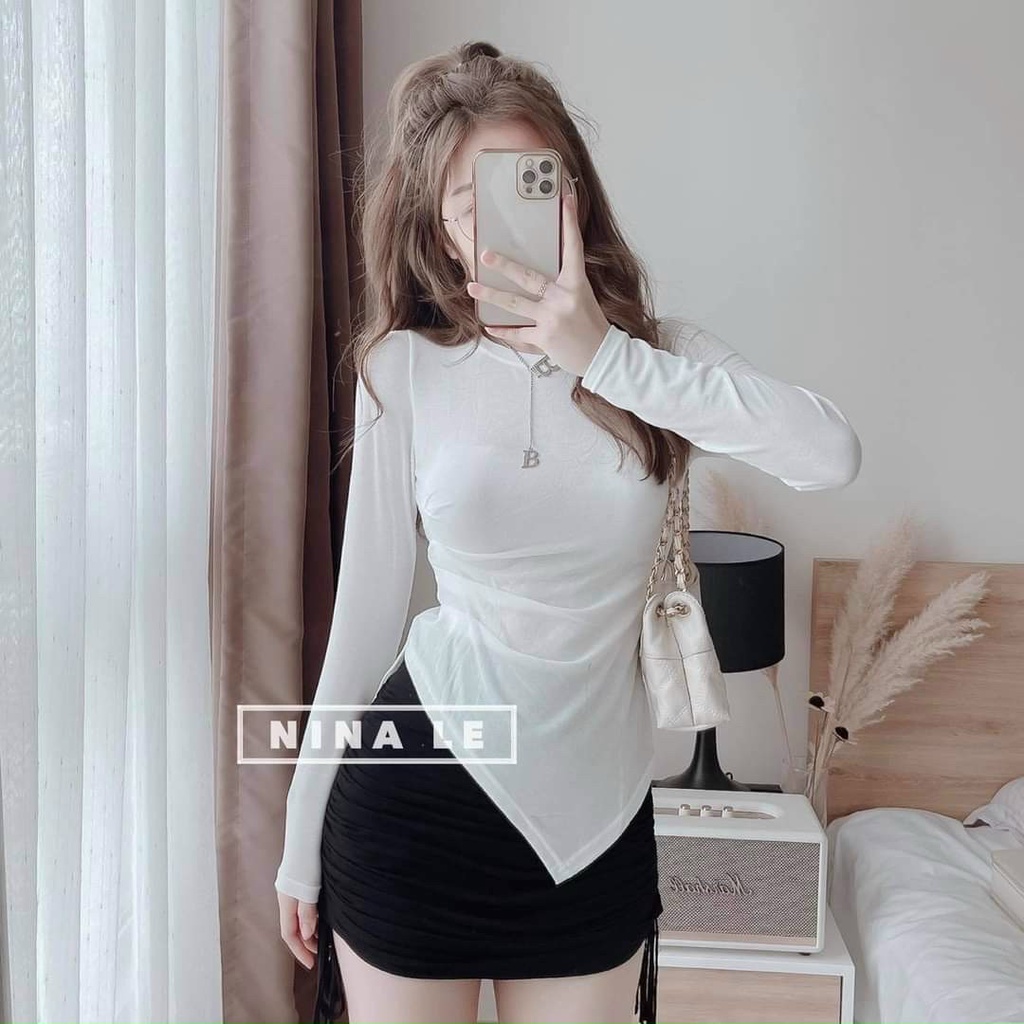 Sét bộ áo dài sẻ tà chéo kết hợp với chân váy rút eo 2 bên nhìn trẻ trung năng động cho các càng đi dạo phố đi chơi