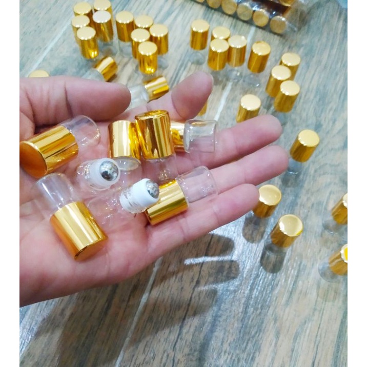 5lọ thủy tinh 1ml nắp vàng dài ,ngắn bi lăn kim loại thếp không rỉ chiết tinh dầu dubai đựng nước hoa mini tiện dụng