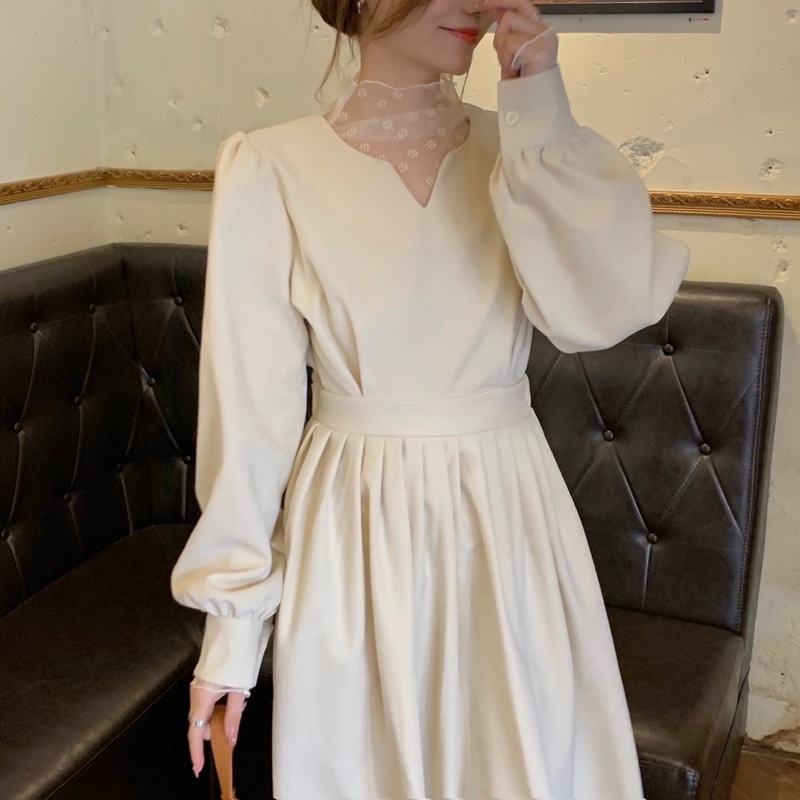 Đầm sơ mi dáng babydoll màu kem dài tay dáng dài midi