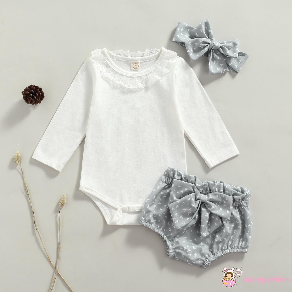 Áo liền thân tay dài cổ tròn màu sắc đơn giản và Quần short in họa tiết và Băng đô nơ cho bé gái