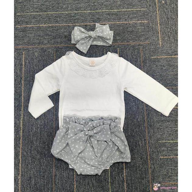 Áo liền thân tay dài cổ tròn màu sắc đơn giản và Quần short in họa tiết và Băng đô nơ cho bé gái