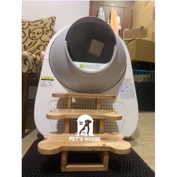 Bật thang máy vệ sinh tự động cho mèo