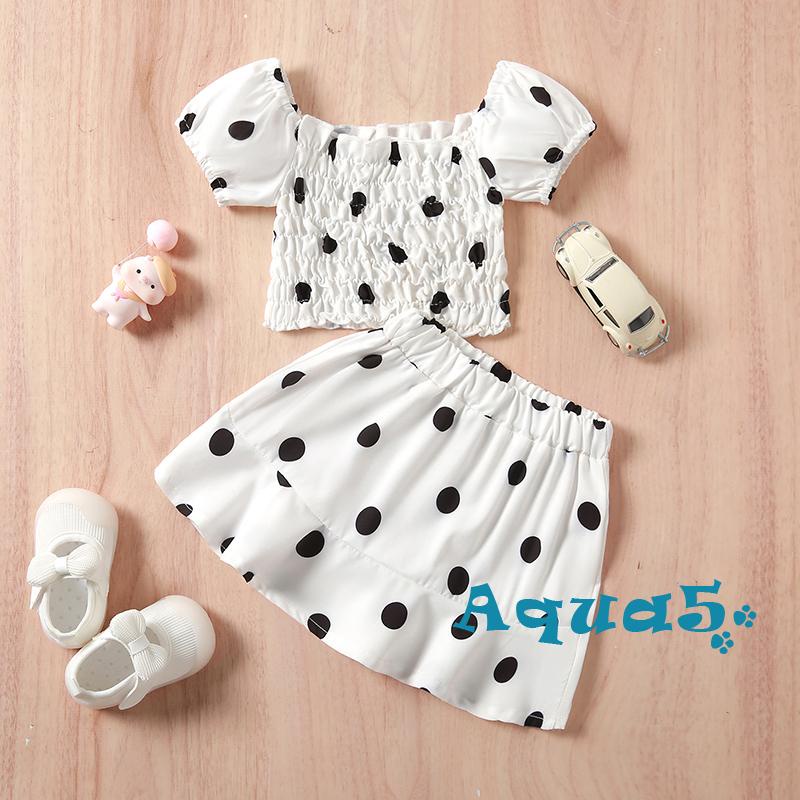 Set đồ mùa hè 2 món gồm áo crop top tay ngắn cổ vuông và chân váy ngắn họa tiết chấm bi cho bé gái