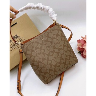 Túi Coach da thật pha canvas dáng ống màu mới