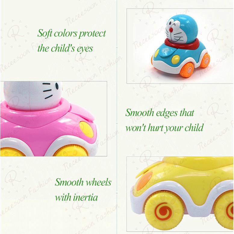 Xe đồ chơi lắc tạo hình Doraemon cho bé