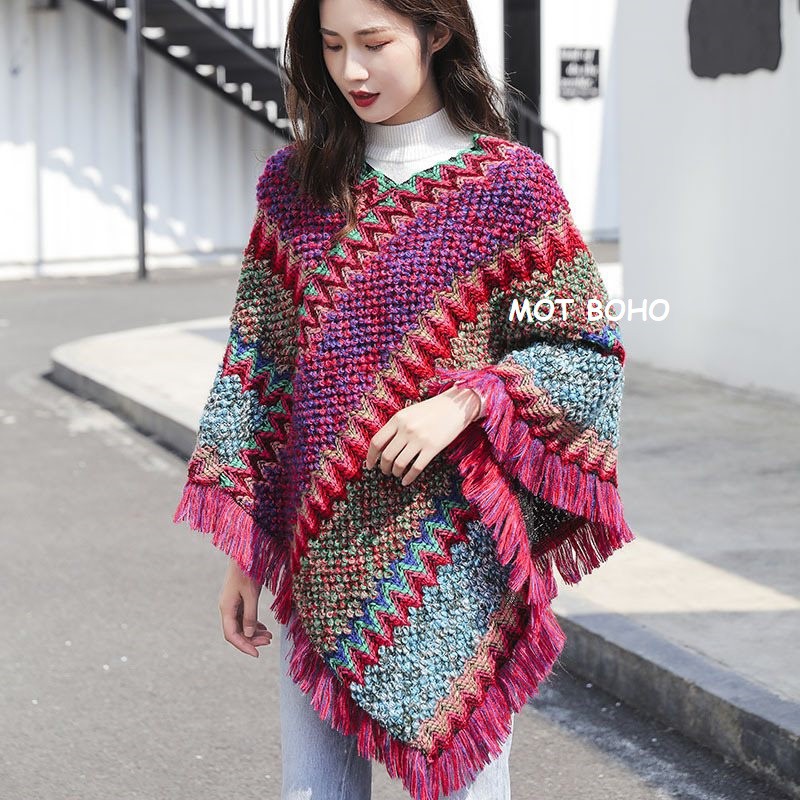 Áo poncho thổ cẩm, tua rua đỏ cam