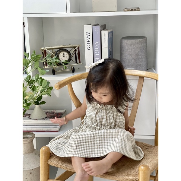 Váy babydoll caro nhí nâu + kẹp nơ