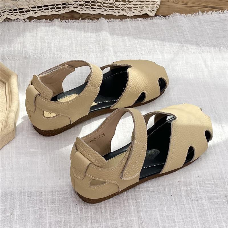 Xăng đan Da Đế Bằng Mũi Tròn Khoét Lỗ Phong Cách Roman Cho Nữ