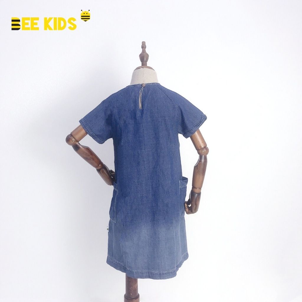 Váy Bò Trơn Dáng Suông Cho Bé Gái Bee Kids Có Túi Và Cúc Cài Sau Gáy (7 - 12 Tuổi) 7DJ01129CA