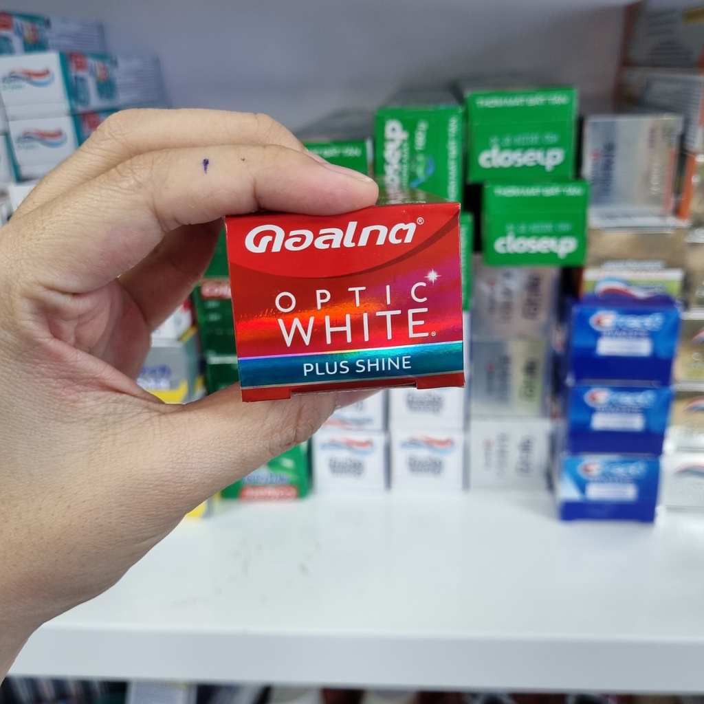 Kem đánh trắng răng COLGATE Optic White Plus Shine 100g [trắng sáng răng sau 1 tuần sử dụng]