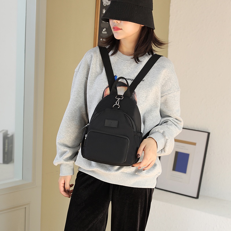 Ba Lô Vải Oxford Màu Trơn Siêu Nhẹ Chống Thấm Nước Thời Trang Phong Cách Mới Cho Nữ