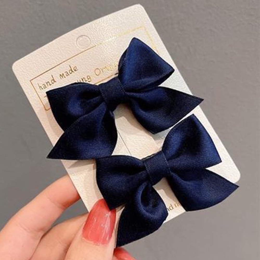 Set 2 kẹp tóc đính nơ phong cách dễ thương cho bé gái