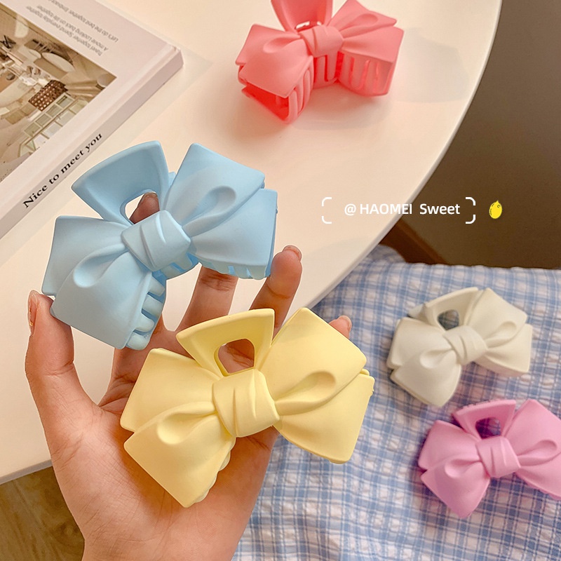 Kẹp bấu tóc hình nơ bằng nhựa màu kẹo xinh xắn