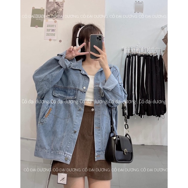 Áo khoác bò túi tag da