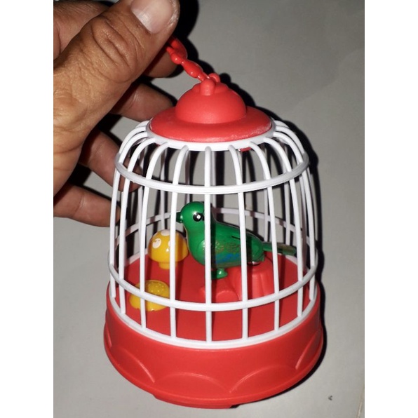 Một chiếc lồng chim mini bằng nhựa có nhạc và đèn rất đẹp Tặng kèm pin