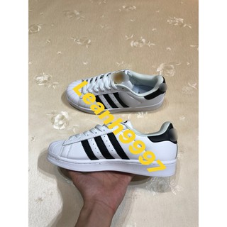 Giày thể thao sneaker kẻ đen