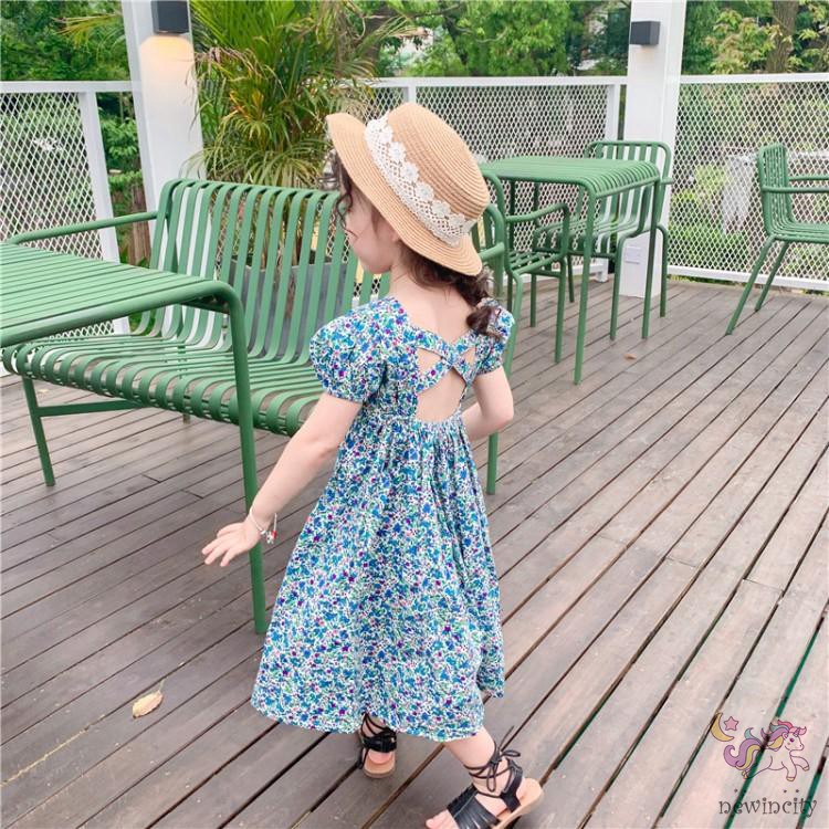 Đầm hoa hở lưng cho bé gái