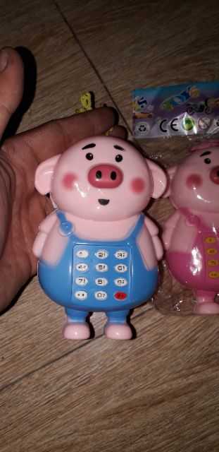 Điện thoại mô hình Heo con bằng nhựa có nhạc tặng kèm PIN