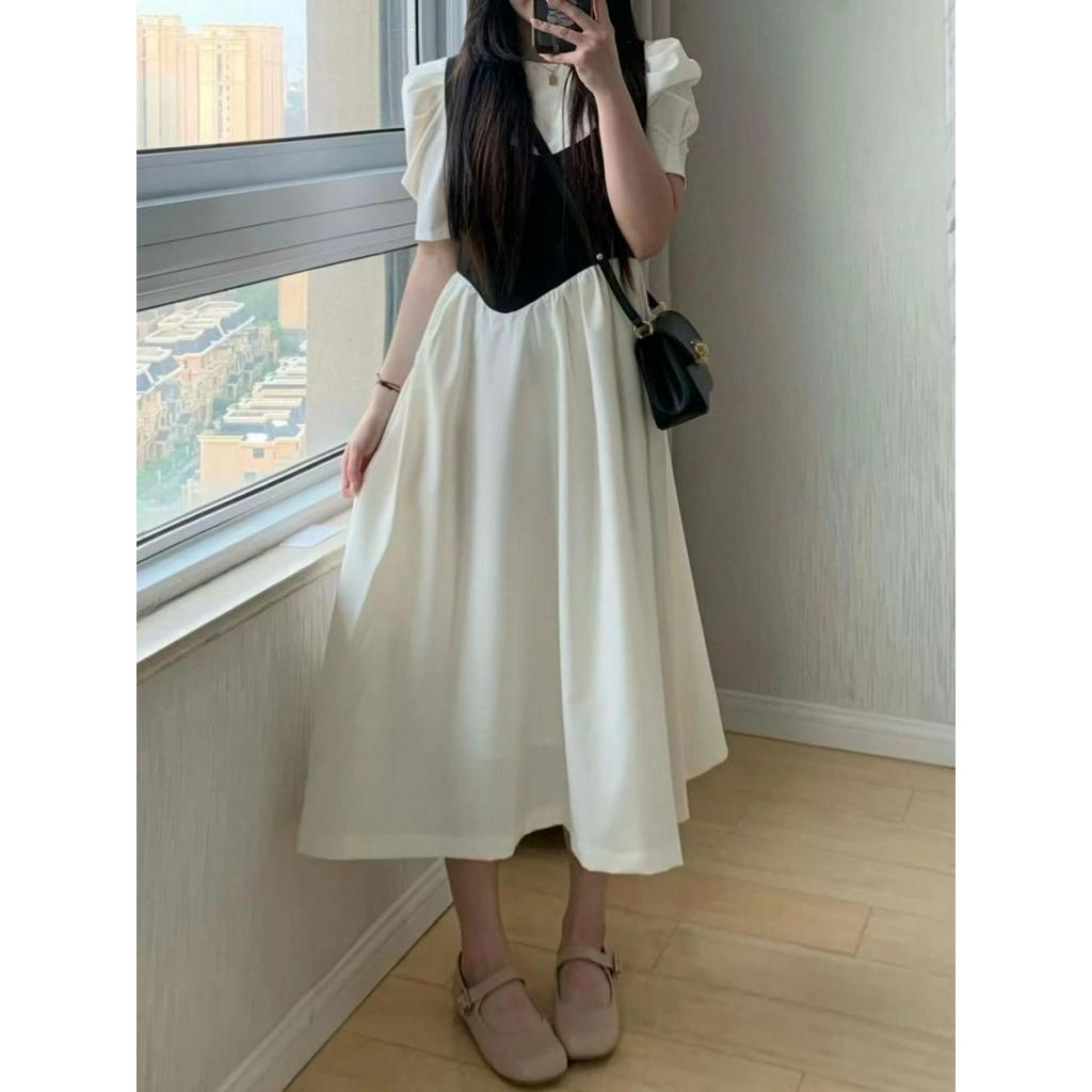 Đầm tiểu thư màu trắng dáng midi áo đen cá tính trendy